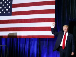 Republican presidential candidate Donald Trump gestures as he arrives to speak at a campaign rally at the Florida State Fairgrounds, Saturday, Nov. 5, 2016, in Tampa, Fla. (AP Photo/ Evan Vucci)/FLEV106/16310540070580/1611051607